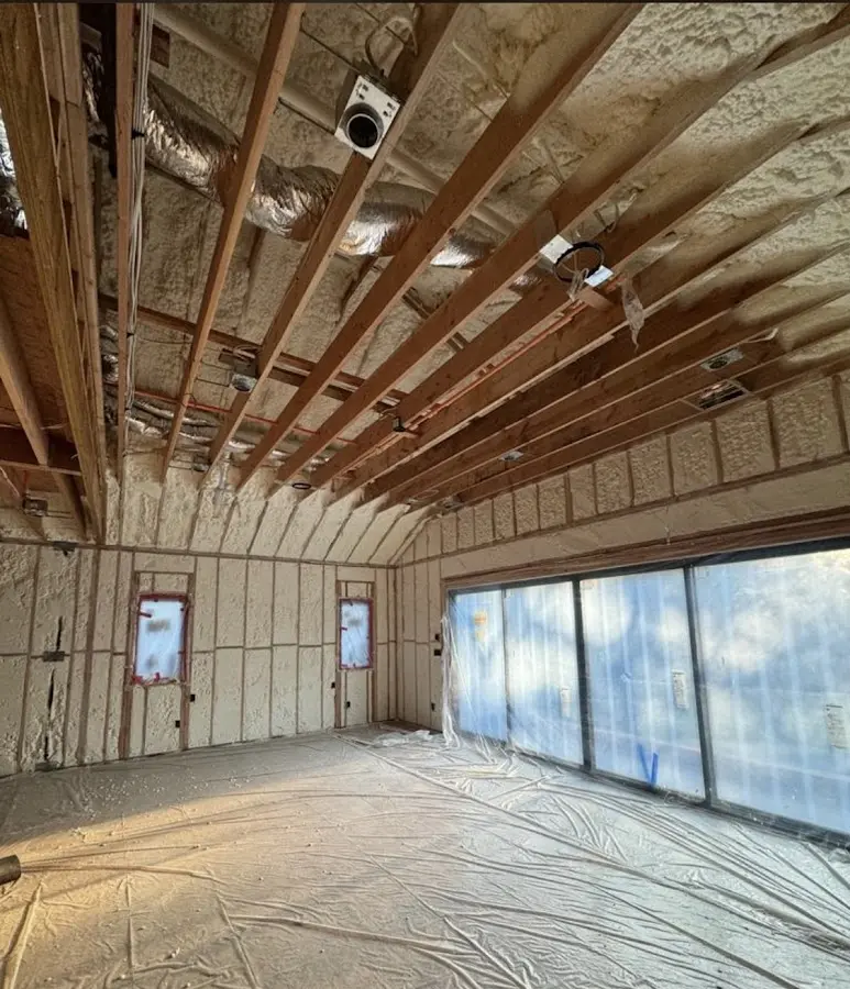 Interior walls and ceiling insulated with spray foam during new construction in Milliken